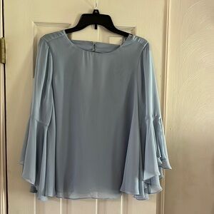 Jennifer Lopez Light Blue Blouse with Flowing Sleeves